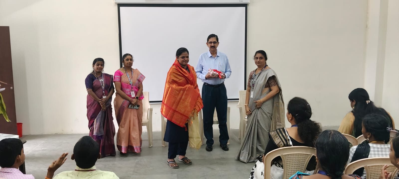 Felicitation of Dr. Safrine by the college
